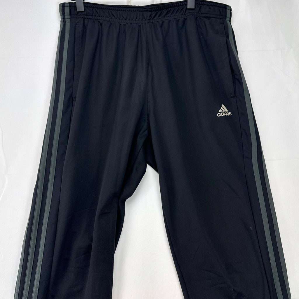 Men's black adidas straight leg track pants with gray 3-stripes in size medium
