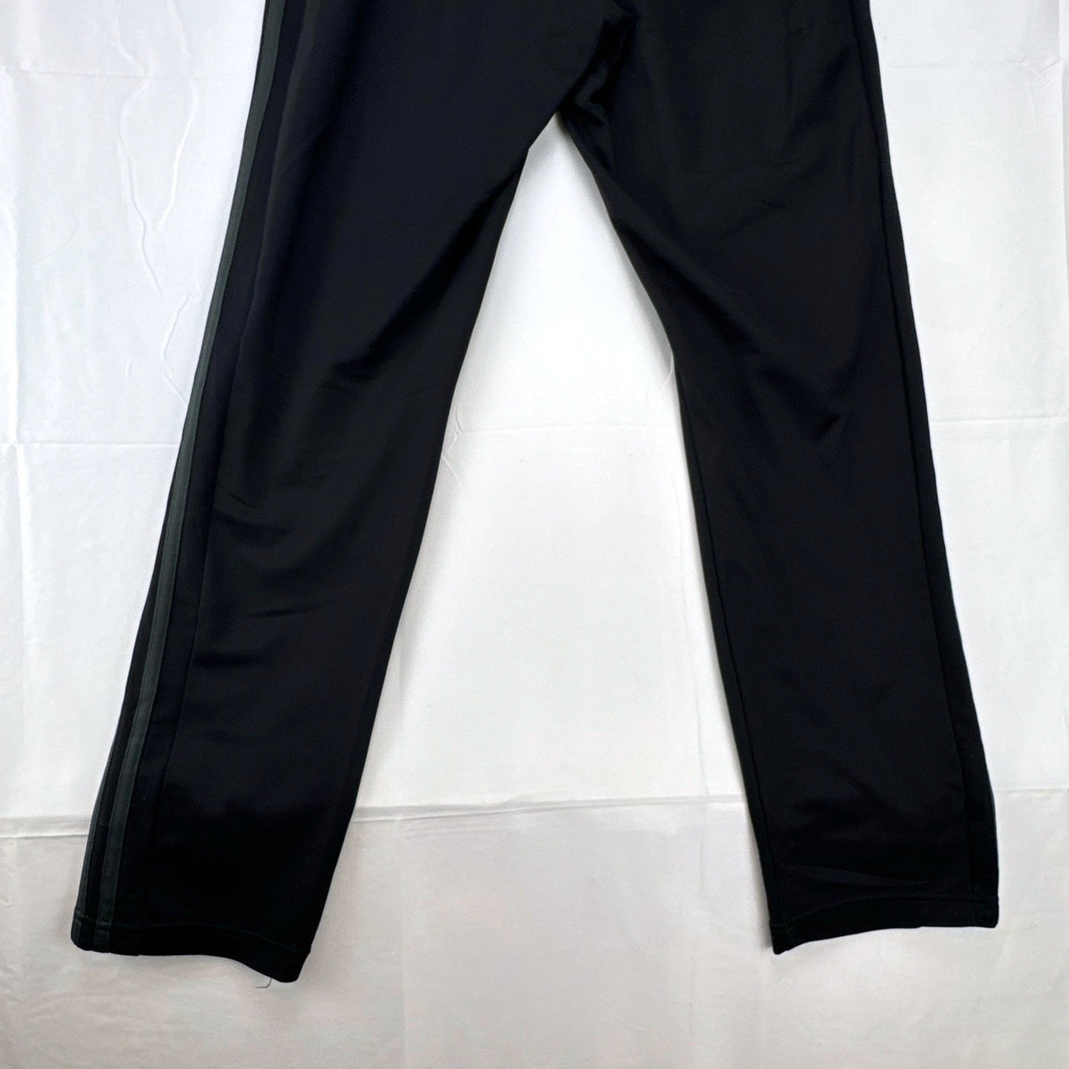Men's black adidas straight leg track pants with gray 3-stripes in size medium