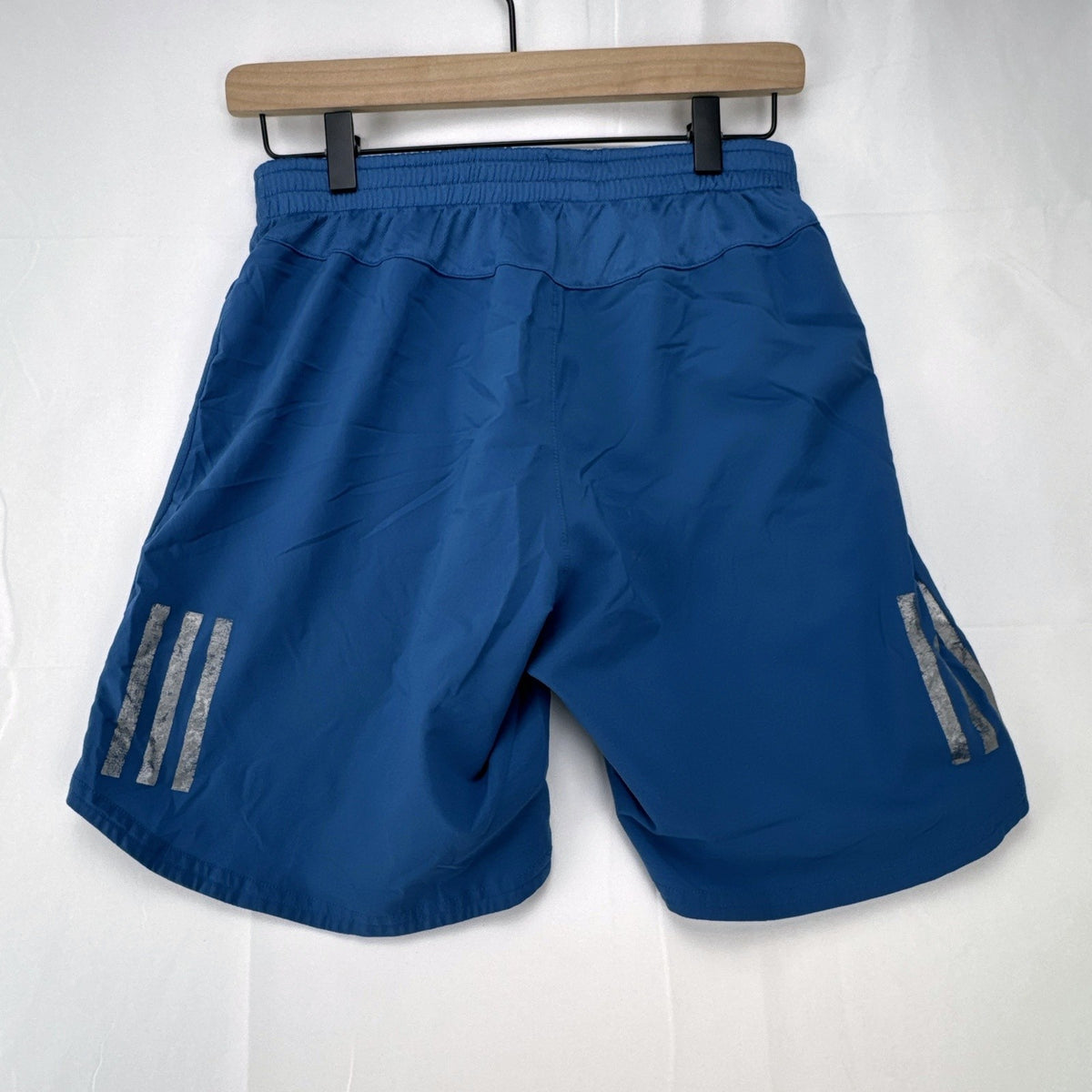 Men's blue adidas Climacool running shorts in size small with zippered pocket and reflective detailing.