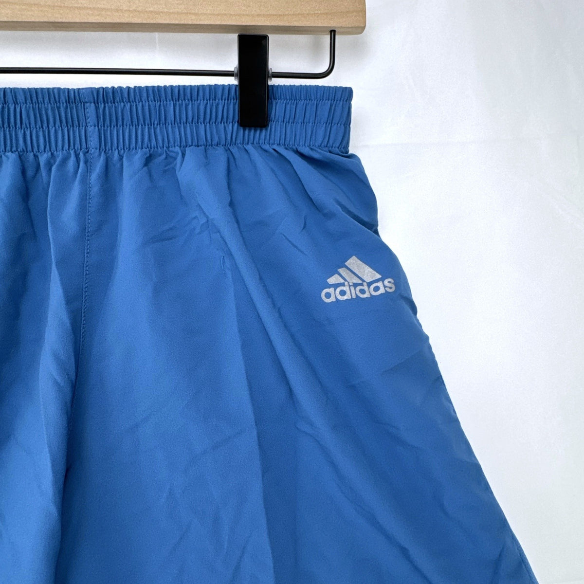 Men's blue adidas Climacool running shorts in size small with zippered pocket and reflective detailing.