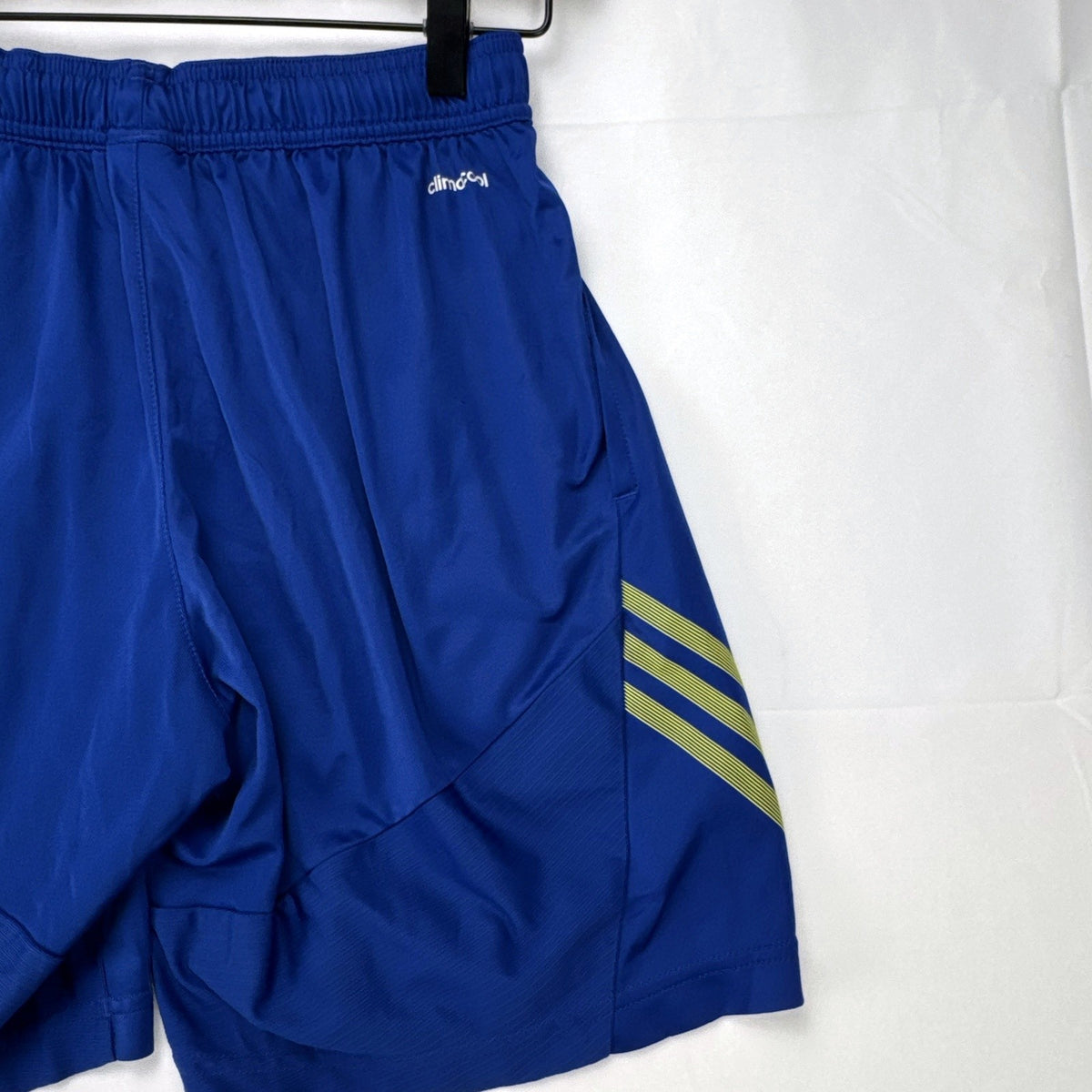 Blue and neon yellow adidas Climacool athletic training shorts in men's size small