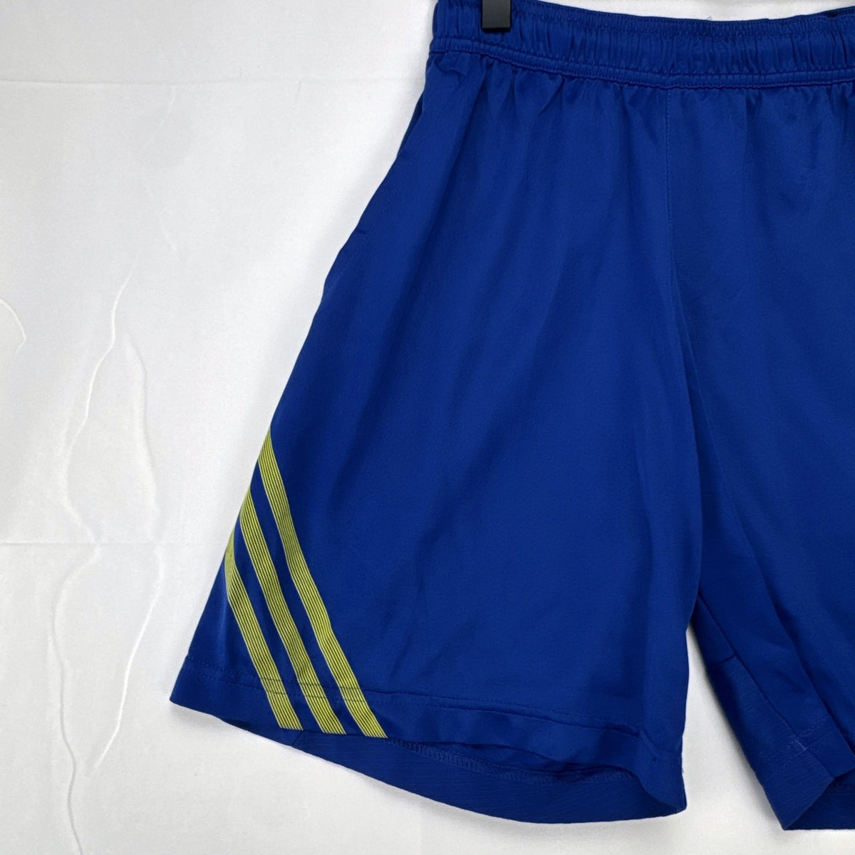 Blue and neon yellow adidas Climacool athletic training shorts in men's size small