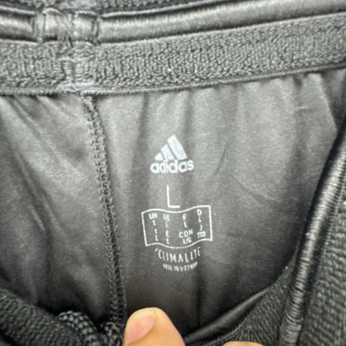 adidas men's size large basketball shorts in charcoal gray and red with Climalite fabric