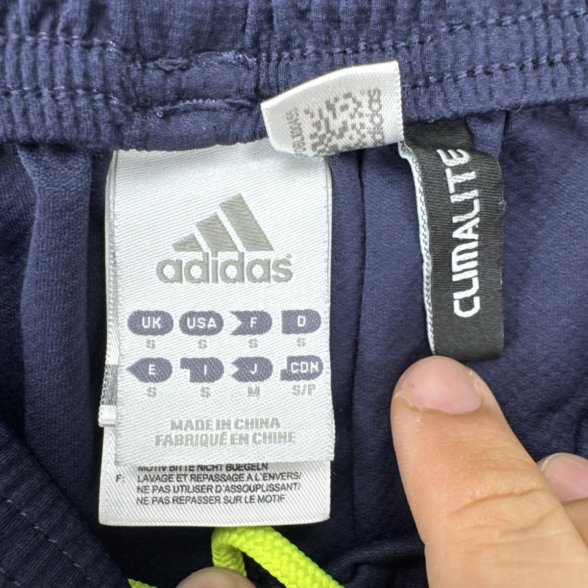 adidas UEFA Champions League soccer shorts in navy blue with neon yellow accents, men's small