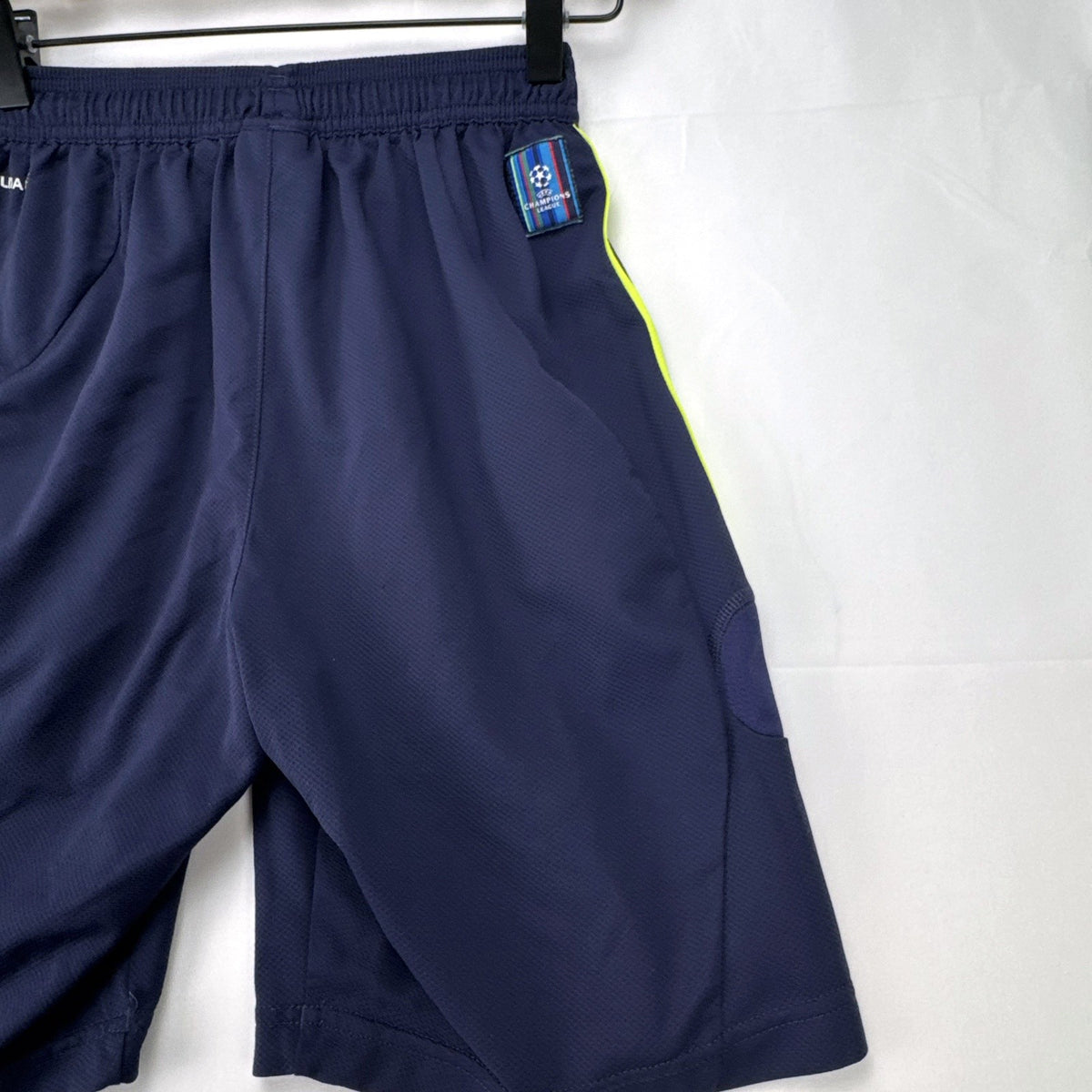 adidas UEFA Champions League soccer shorts in navy blue with neon yellow accents, men's small