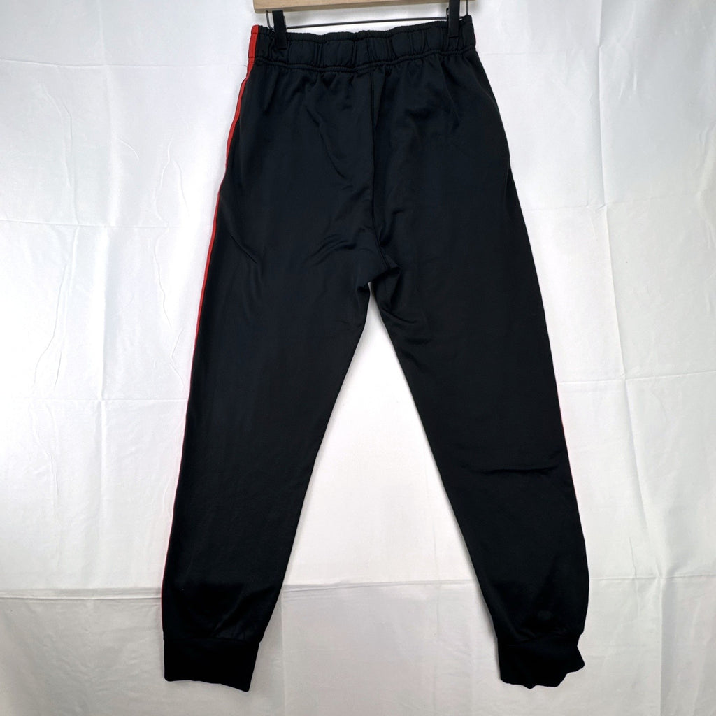 Manchester United men's black and red jogger track pants with club crest in size S