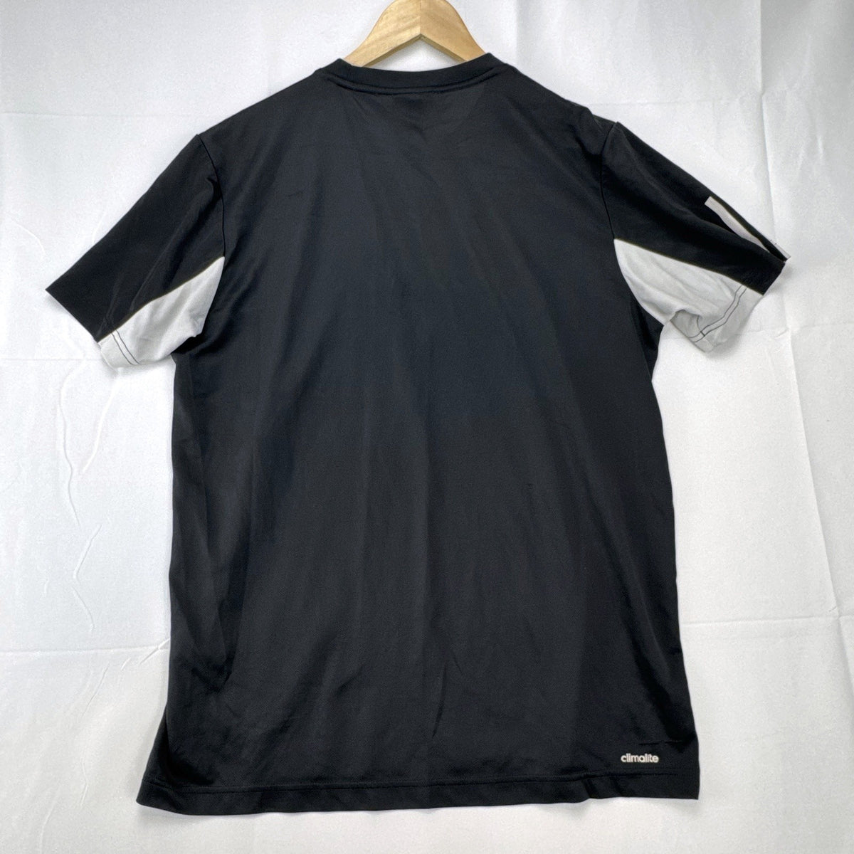 Men's large black adidas Climalite tennis t-shirt with white chest stripe and three-stripe sleeves.