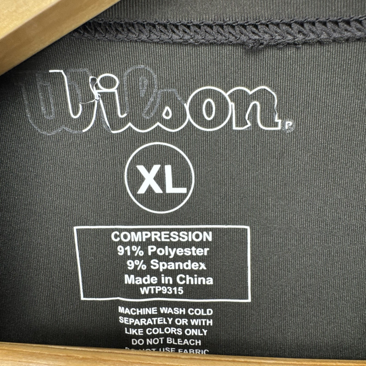 Wilson Protec men's long sleeve compression shirt in charcoal gray, size XL.