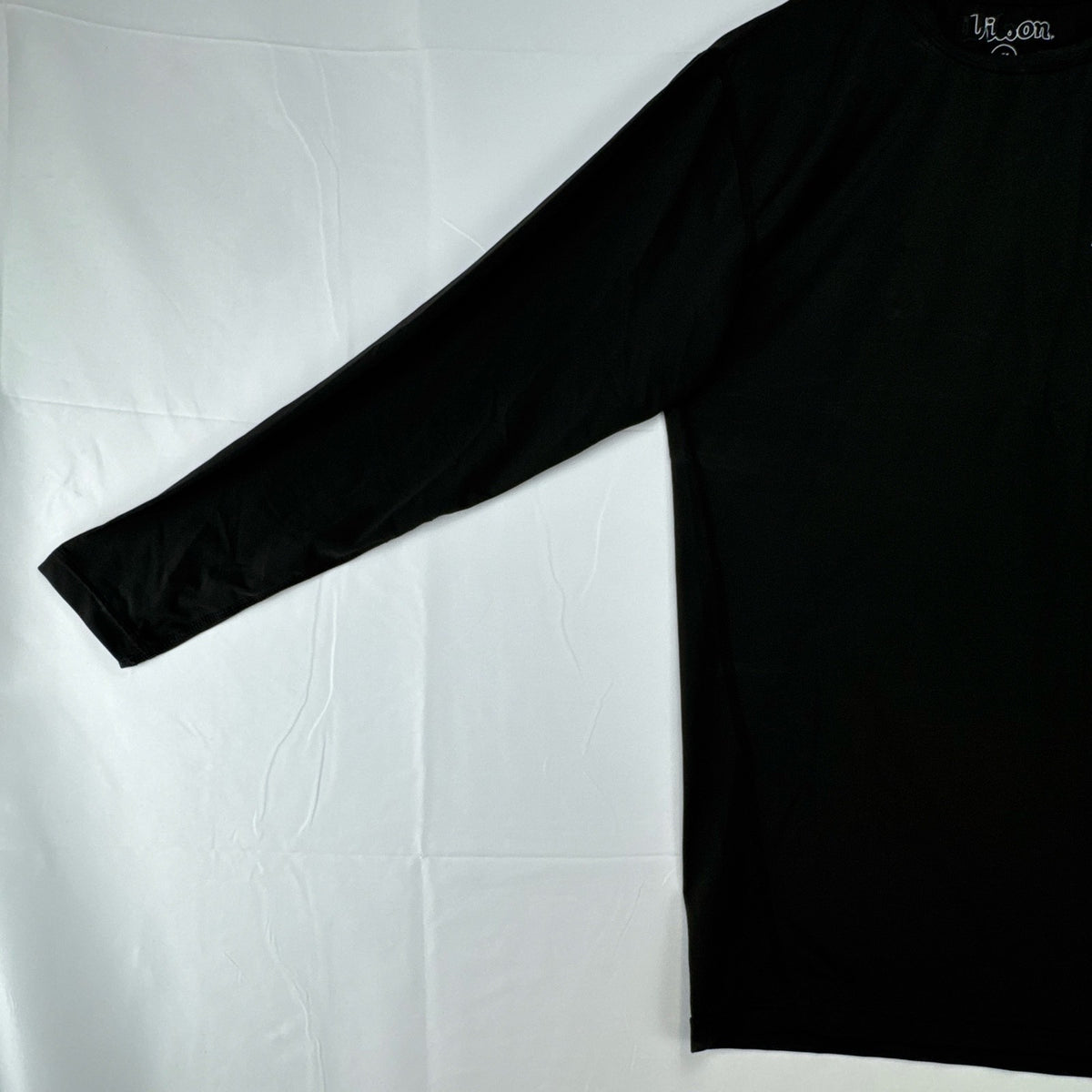 Wilson Protec men's long sleeve compression shirt in charcoal gray, size XL.