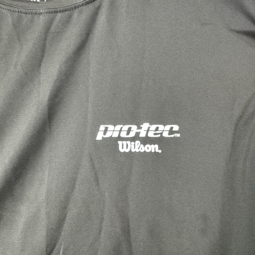 Wilson Protec men's long sleeve compression shirt in charcoal gray, size XL.