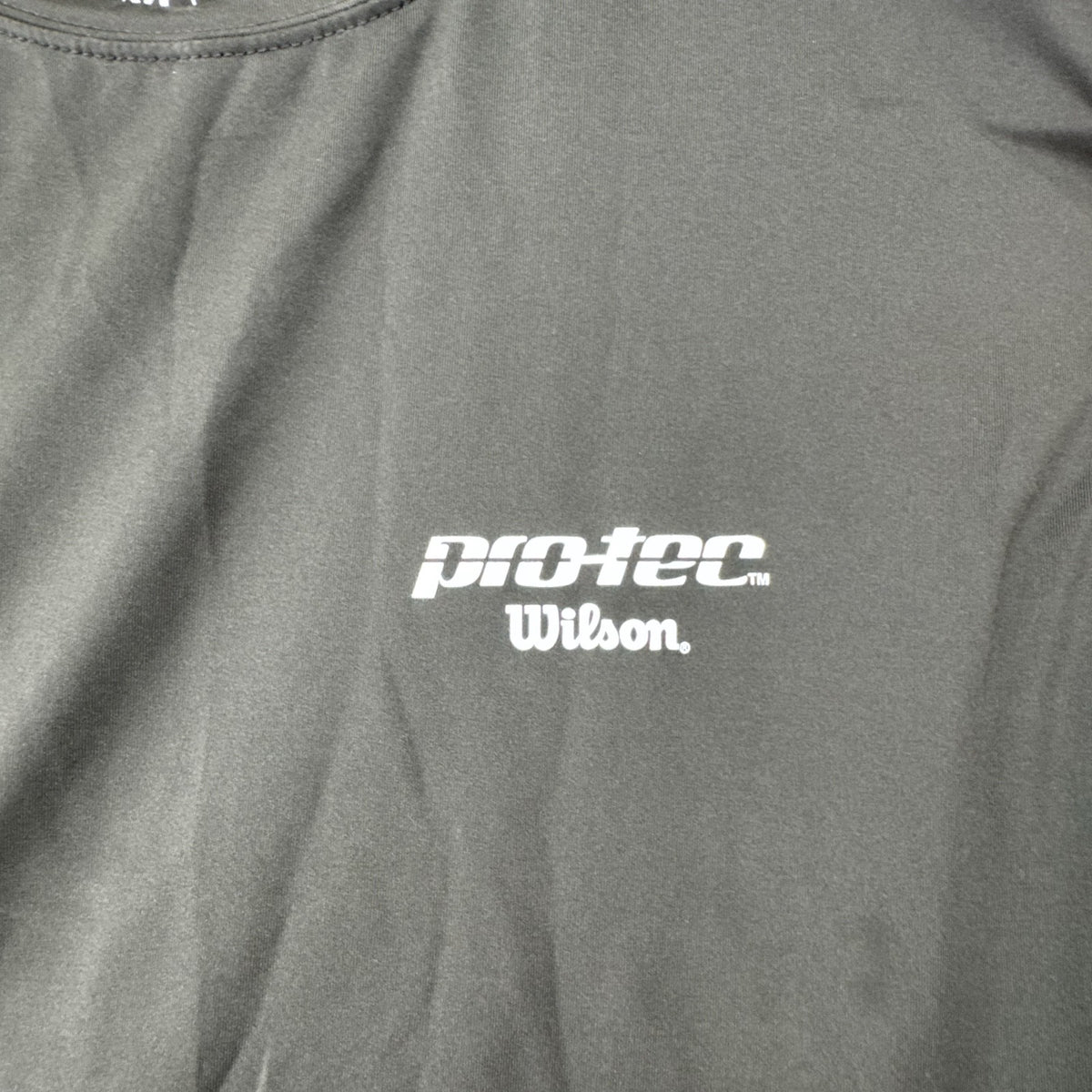 Wilson Protec men's long sleeve compression shirt in charcoal gray, size XL.