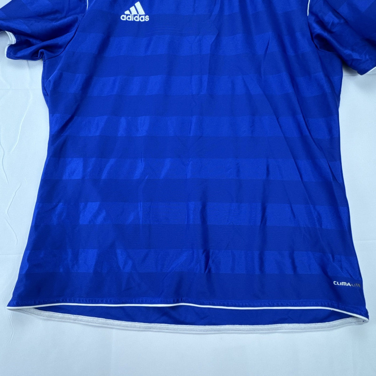 adidas men's Climalite soccer jersey in royal blue with white shoulder stripes, size large
