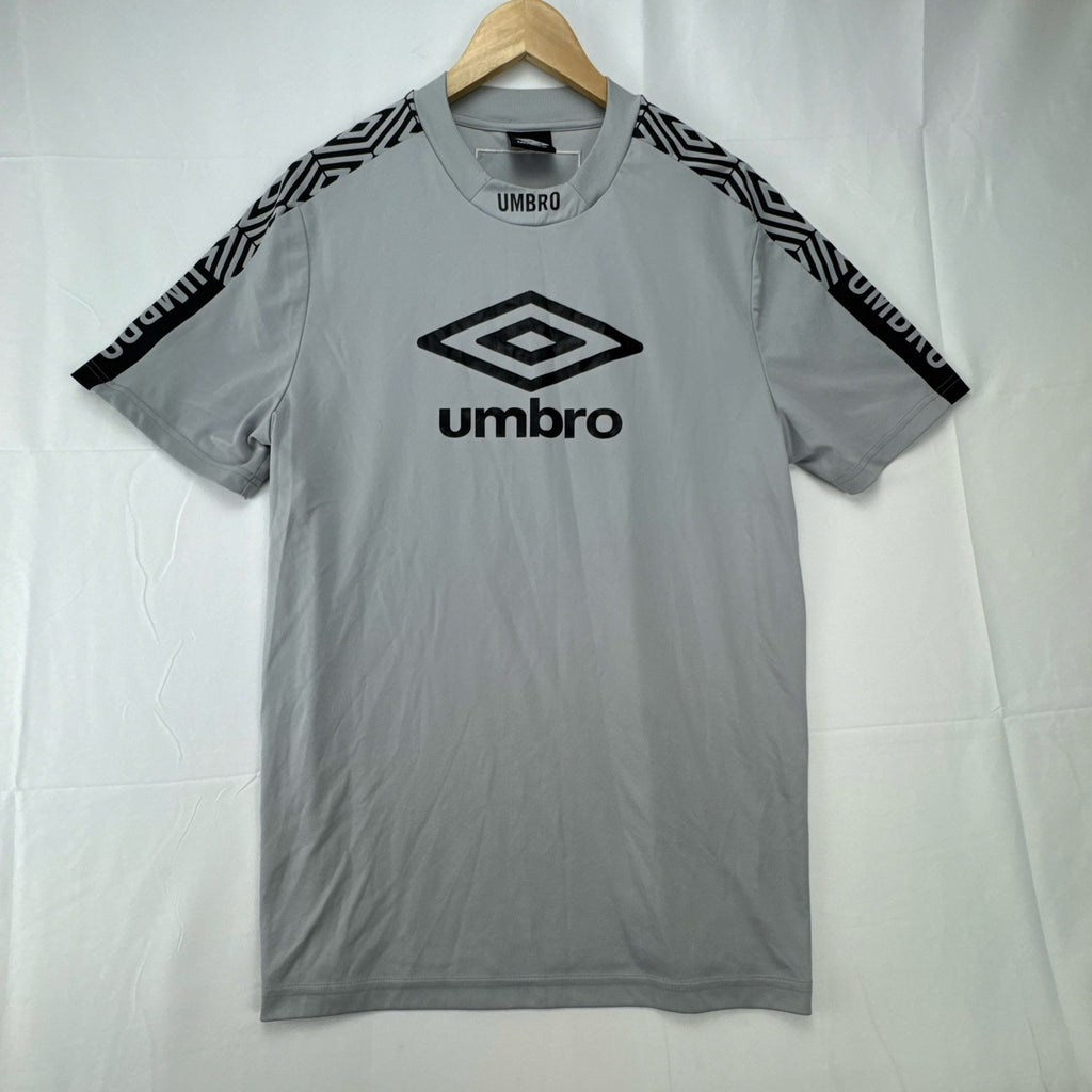 Umbro men's gray short sleeve soccer training jersey in size M featuring logo tape detailing