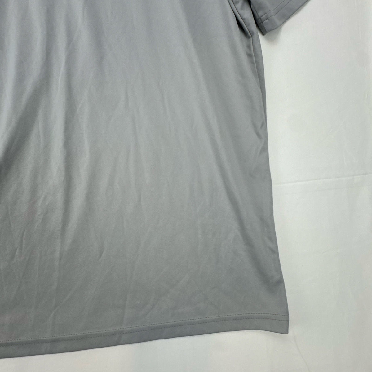 Umbro men's gray short sleeve soccer training jersey in size M featuring logo tape detailing