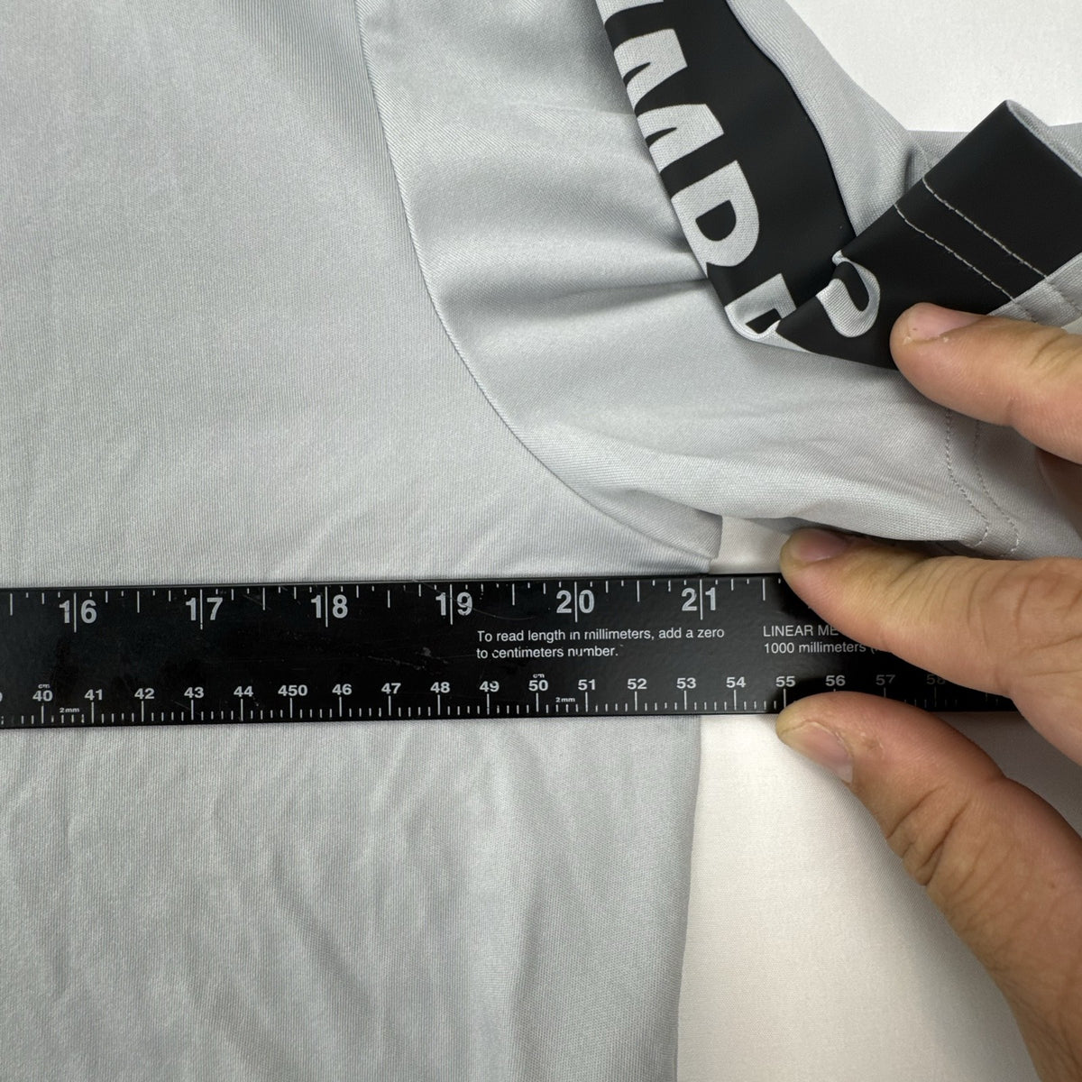 Umbro men's gray short sleeve soccer training jersey in size M featuring logo tape detailing