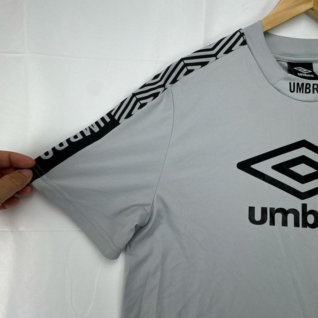 Umbro men's gray short sleeve soccer training jersey in size M featuring logo tape detailing