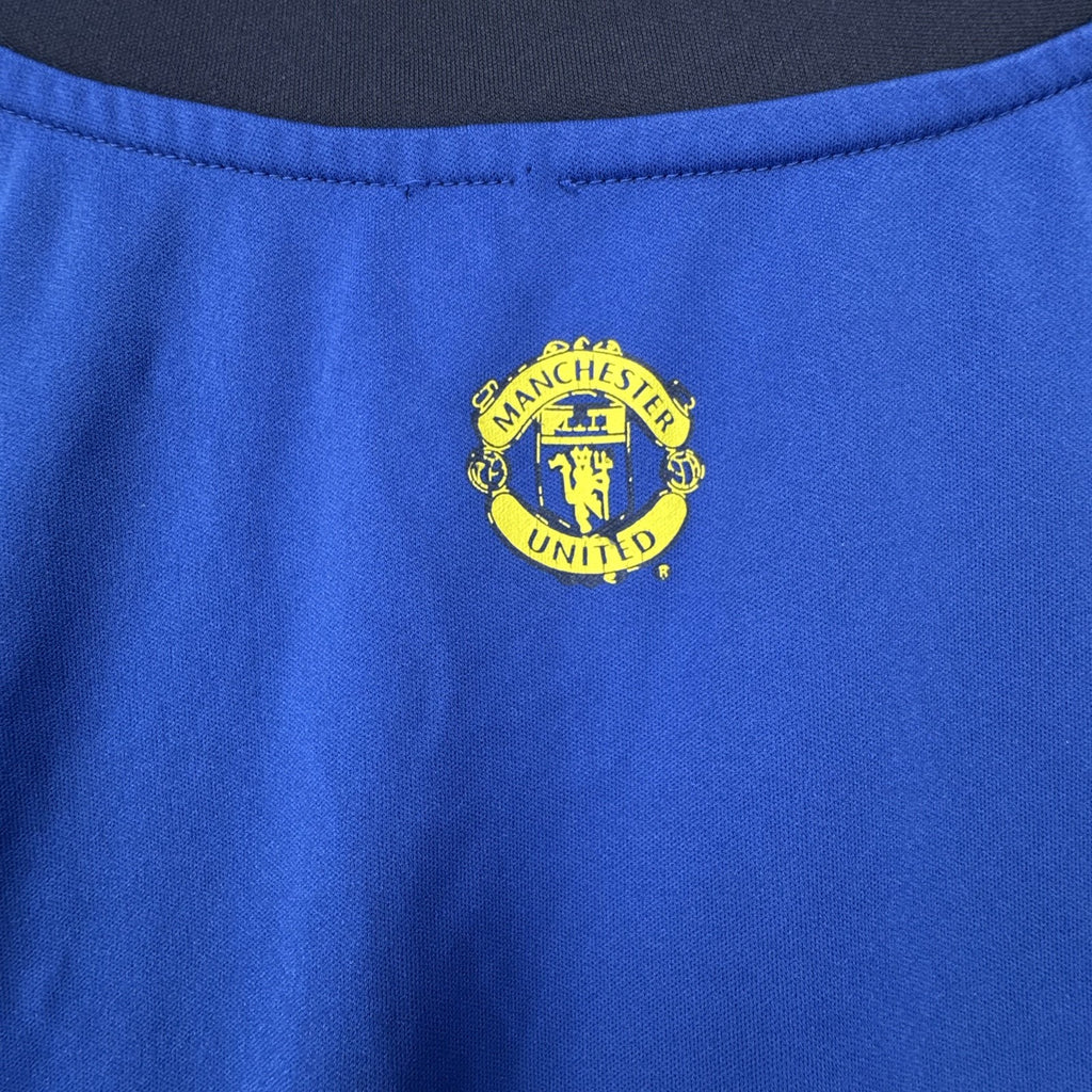 Men's Manchester United royal blue short-sleeve V-neck soccer training jersey in size XL.