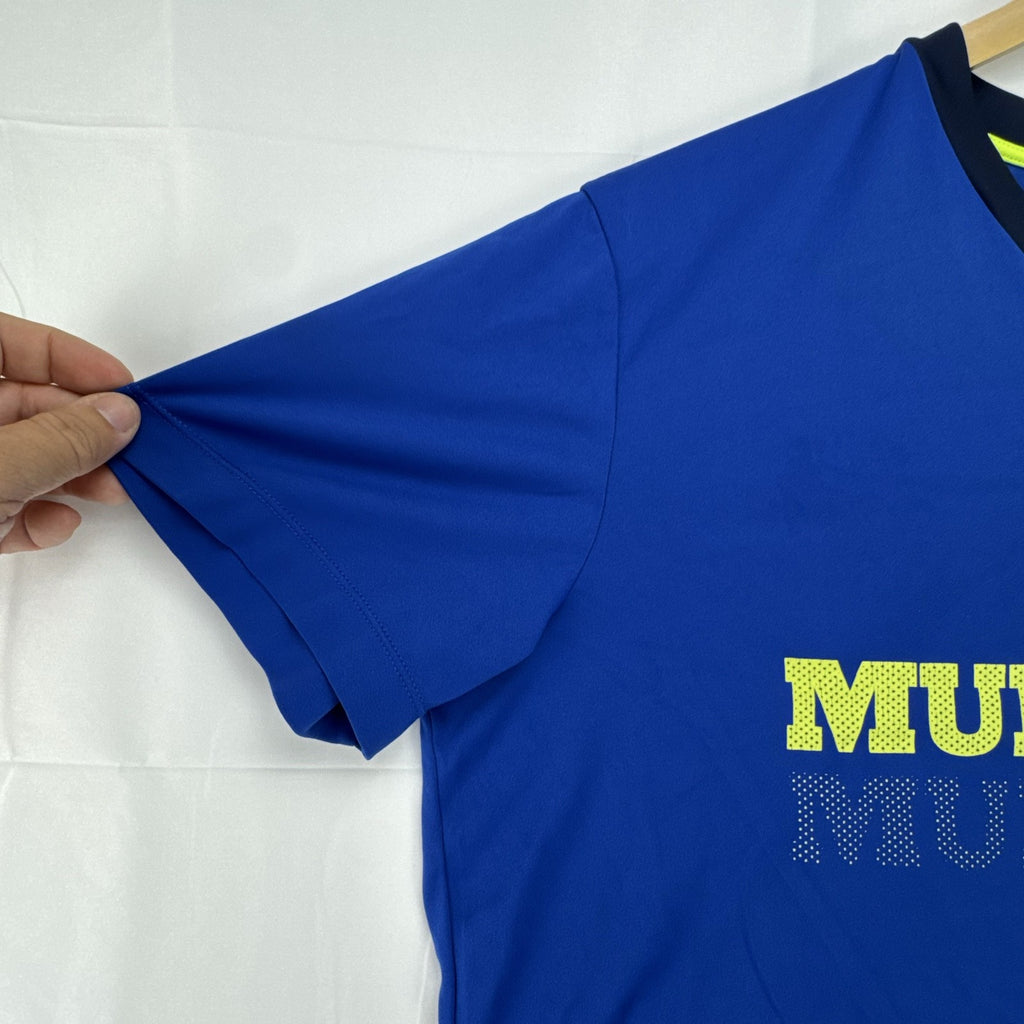 Men's Manchester United royal blue short-sleeve V-neck soccer training jersey in size XL.