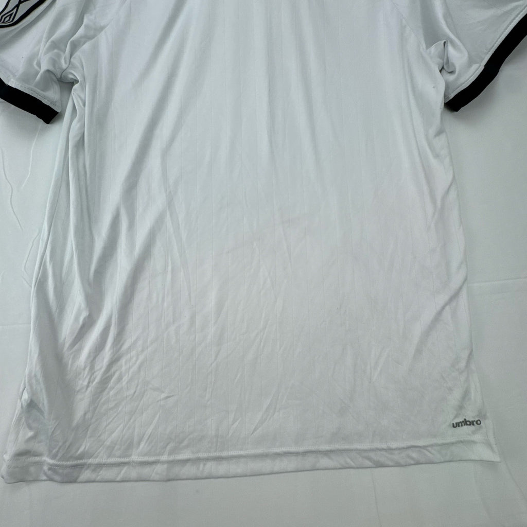 White Umbro soccer jersey in size Large featuring black double diamond taped sleeves and crew neckline.