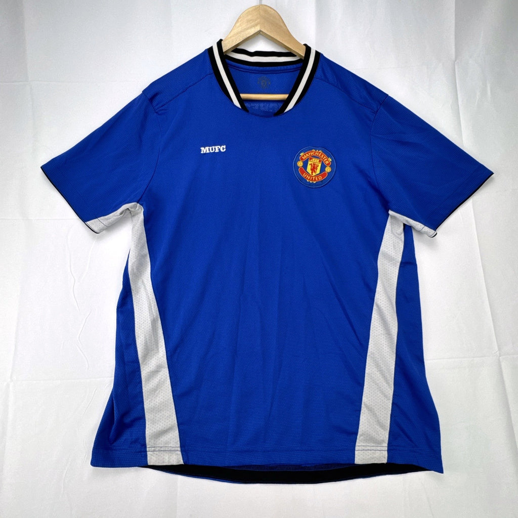 Manchester United men's large royal blue soccer jersey with embroidered chest crest and striped ribbed collar.