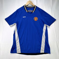 Manchester United men's large royal blue soccer jersey with embroidered chest crest and striped ribbed collar.