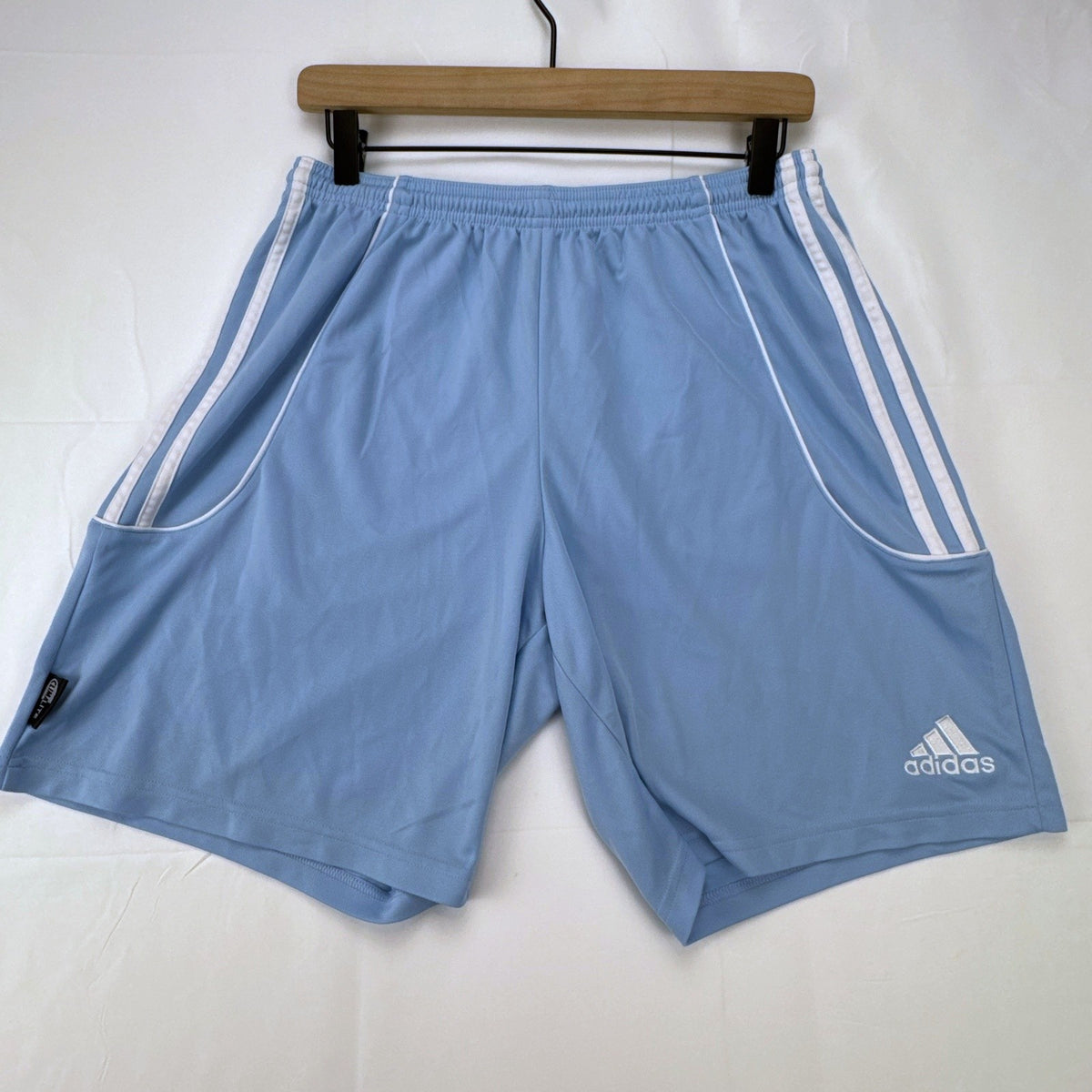 Adidas men's light blue Climalite soccer shorts with white 3-stripes in size Medium.