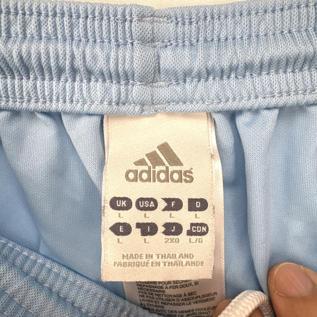 Adidas men's light blue Climalite soccer shorts with white 3-stripes in size Medium.