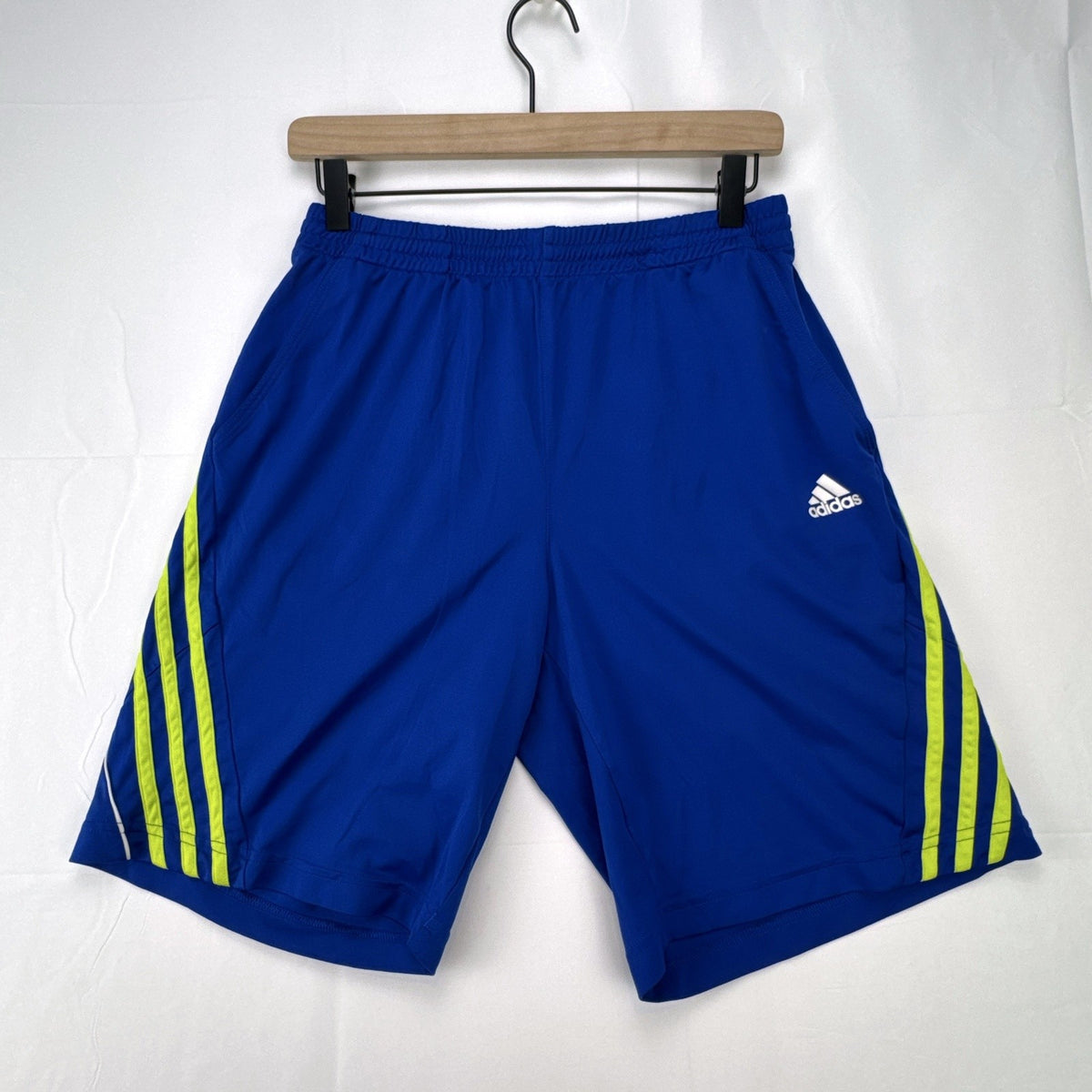 adidas men's royal blue athletic shorts with neon yellow three stripes, size medium