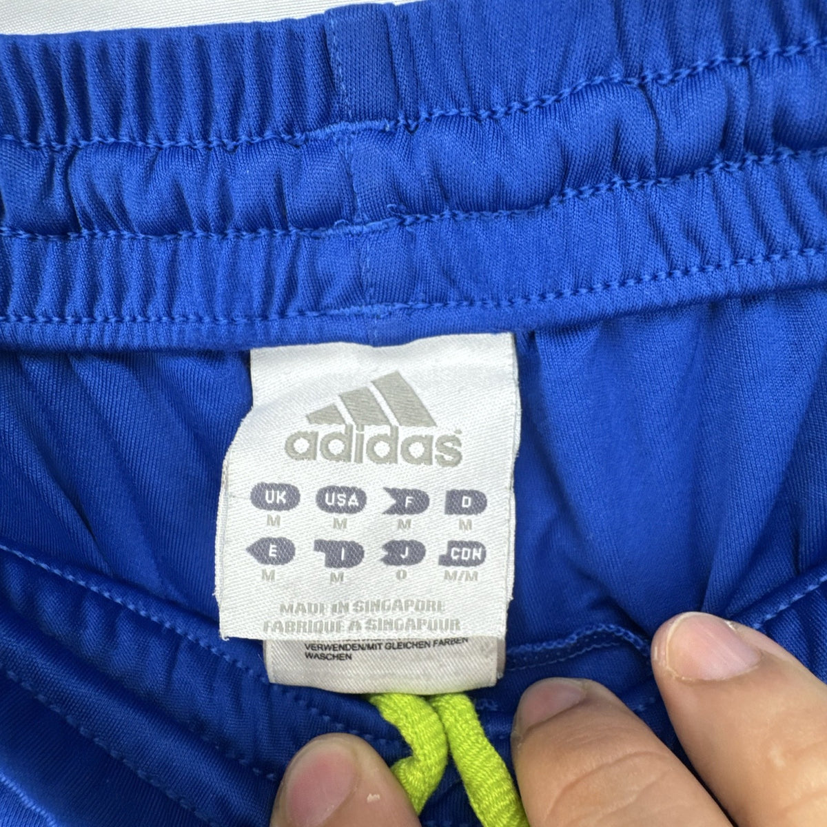 adidas men's royal blue athletic shorts with neon yellow three stripes, size medium