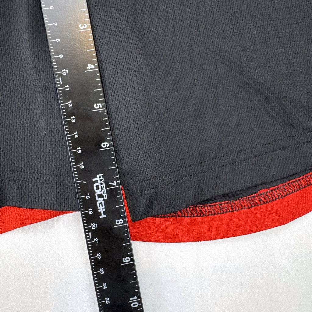 Manchester United men's black and red soccer shorts in size small with woven team crest and embroidered MUFC lettering