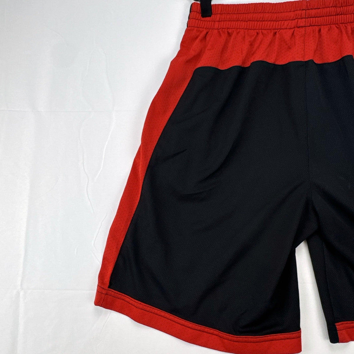 Manchester United men's black and red soccer shorts in size small with woven team crest and embroidered MUFC lettering