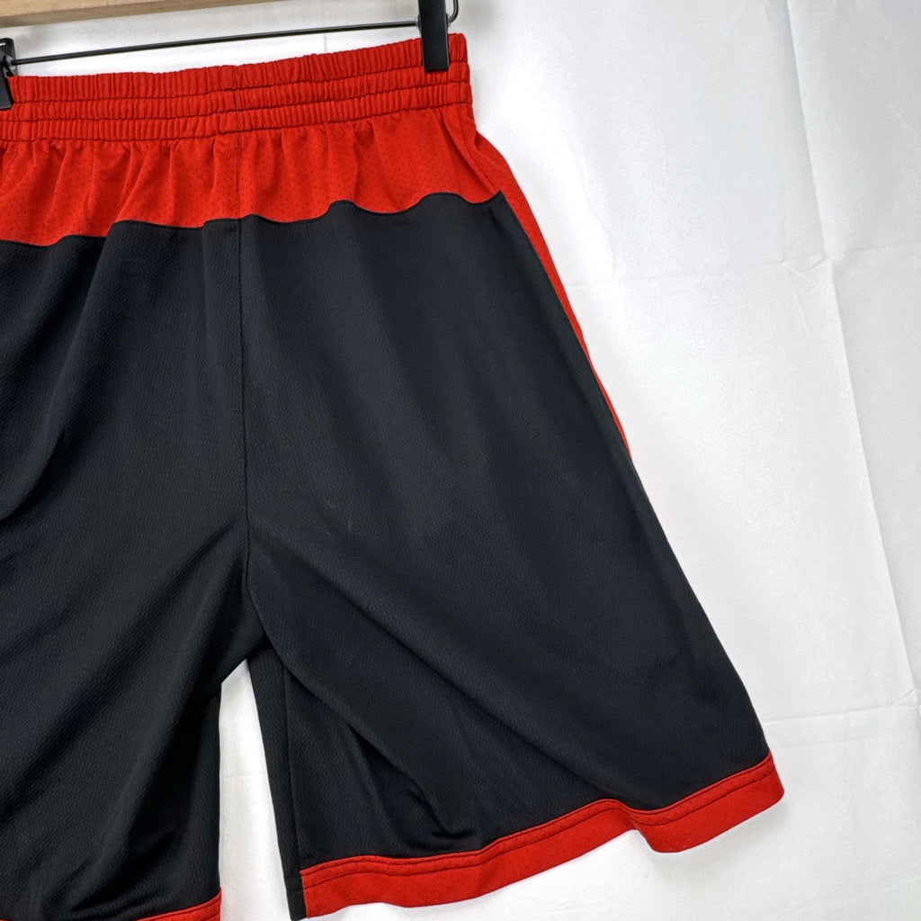 Manchester United men's black and red soccer shorts in size small with woven team crest and embroidered MUFC lettering