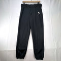 Black Adidas Climalite men's baseball pants with elastic cuffs in size medium