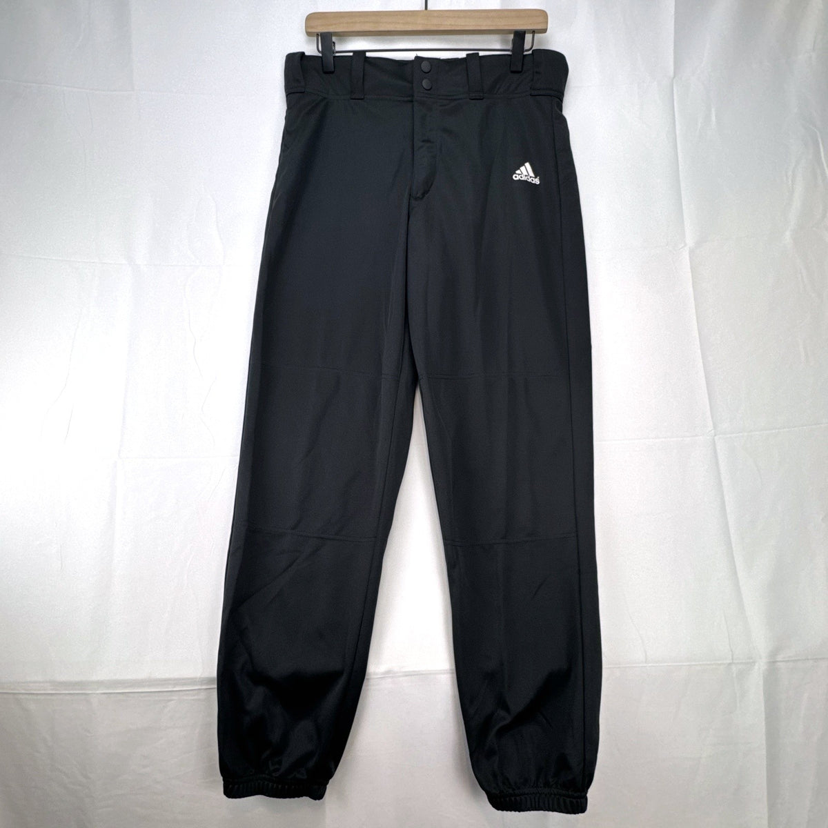 Black Adidas Climalite men's baseball pants with elastic cuffs in size medium