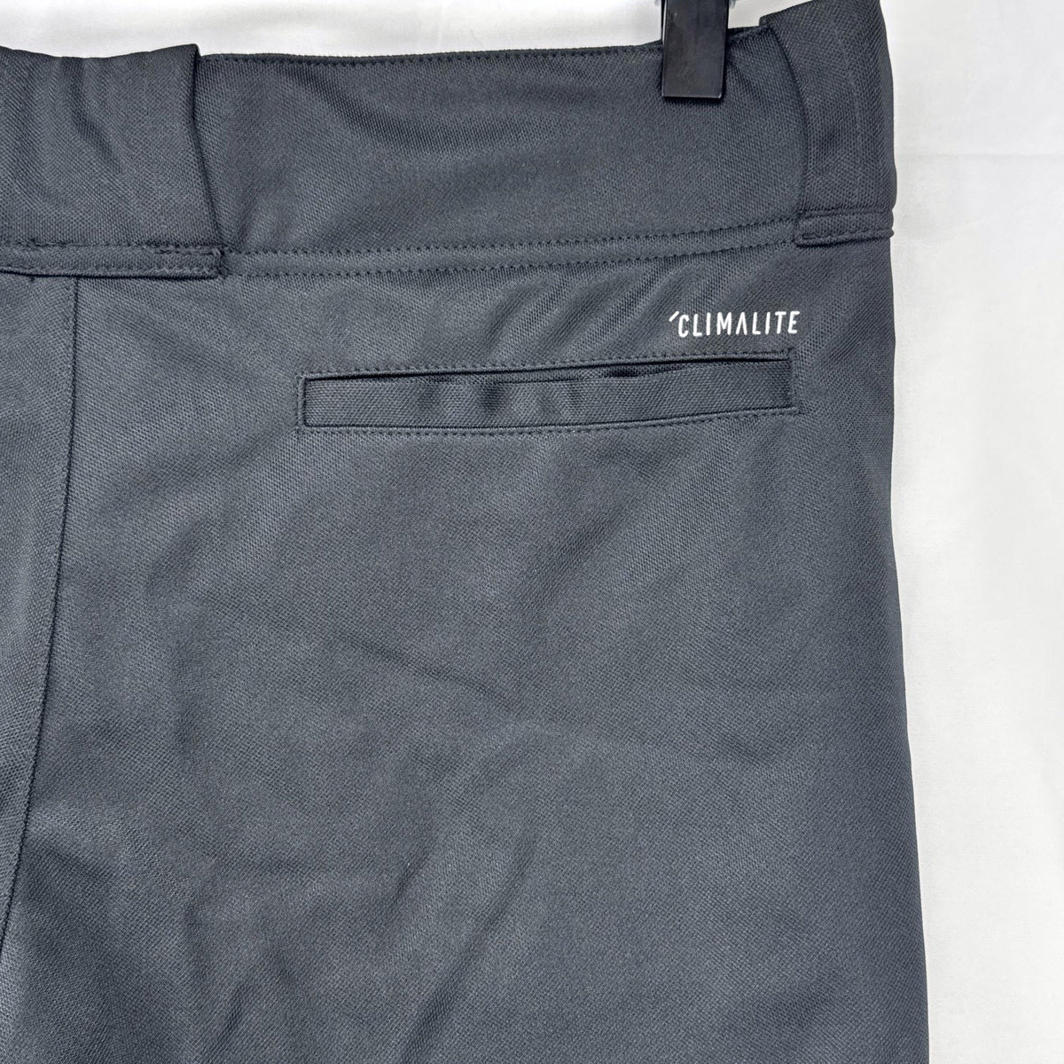 Black Adidas Climalite men's baseball pants with elastic cuffs in size medium