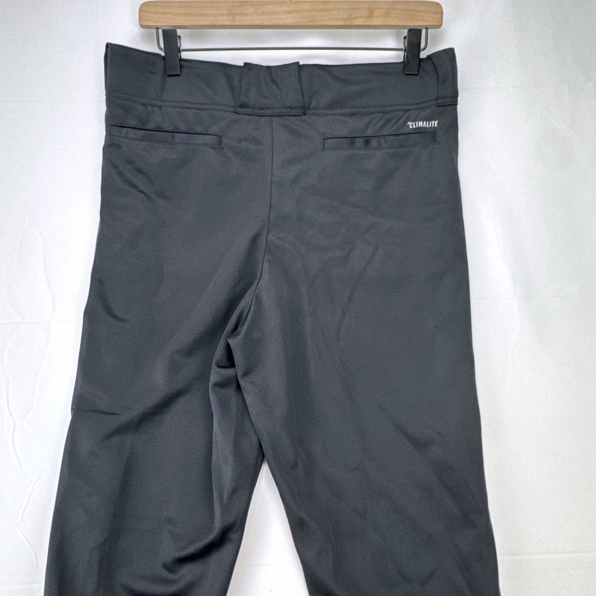 Black Adidas Climalite men's baseball pants with elastic cuffs in size medium