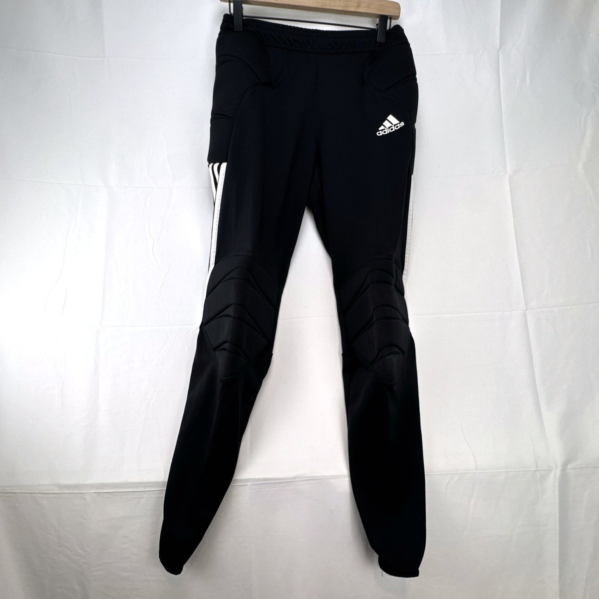 Black adidas Tierro padded goalkeeper soccer pants in men's size M with white 3-stripes