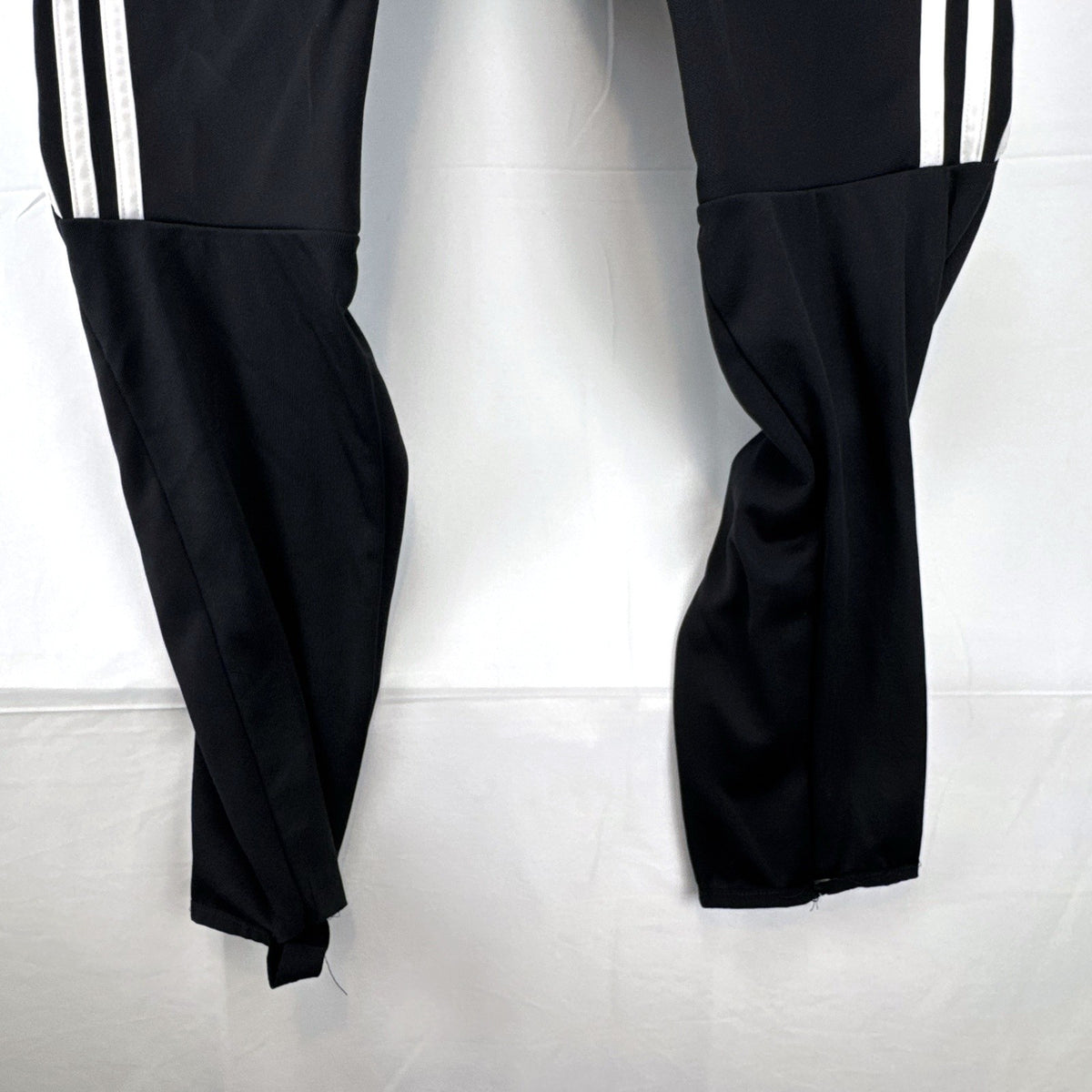 Black adidas Tierro padded goalkeeper soccer pants in men's size M with white 3-stripes