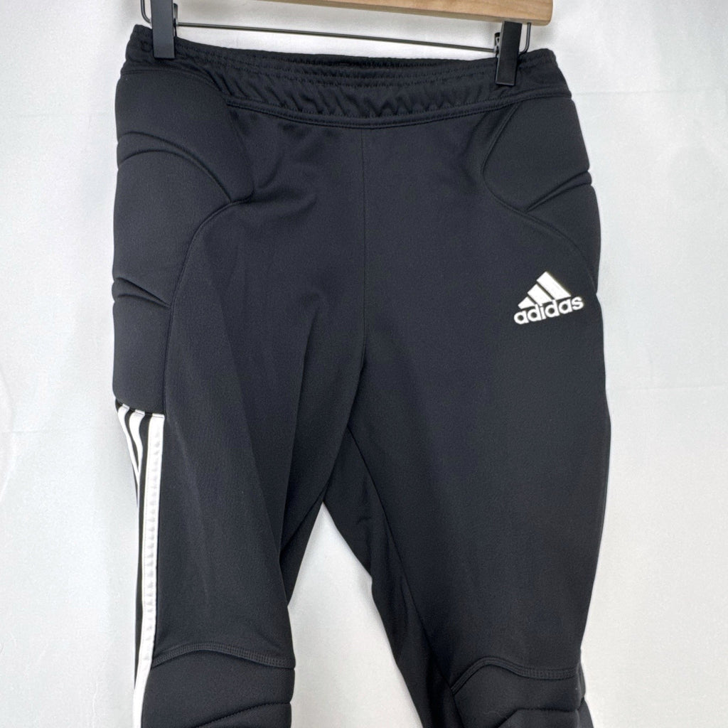 Black adidas Tierro padded goalkeeper soccer pants in men's size M with white 3-stripes