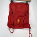Manchester United FC red drawstring gym bag with embroidered crest and black trim