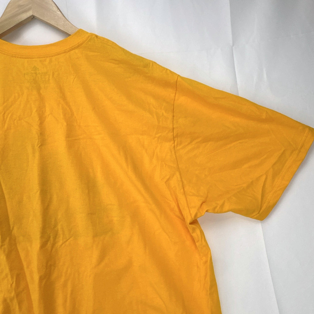 Front view of yellow adidas The Go-To graphic t-shirt in men's XL with black Badge of Sport logo