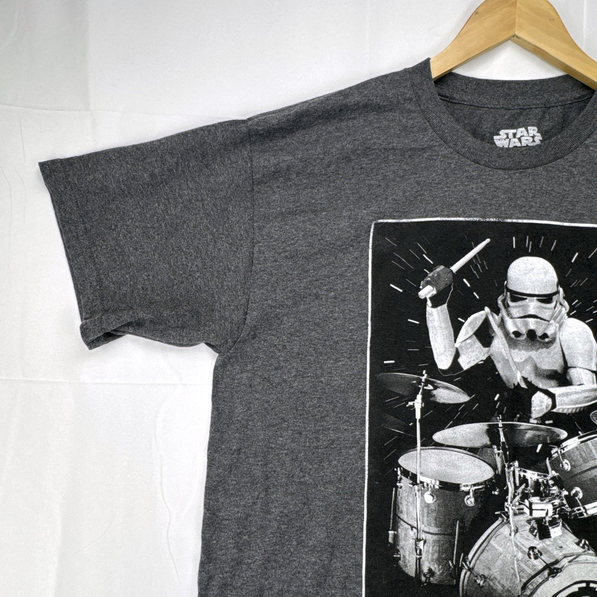 Star Wars men's size large heather charcoal gray t-shirt featuring a Stormtrooper drummer graphic.