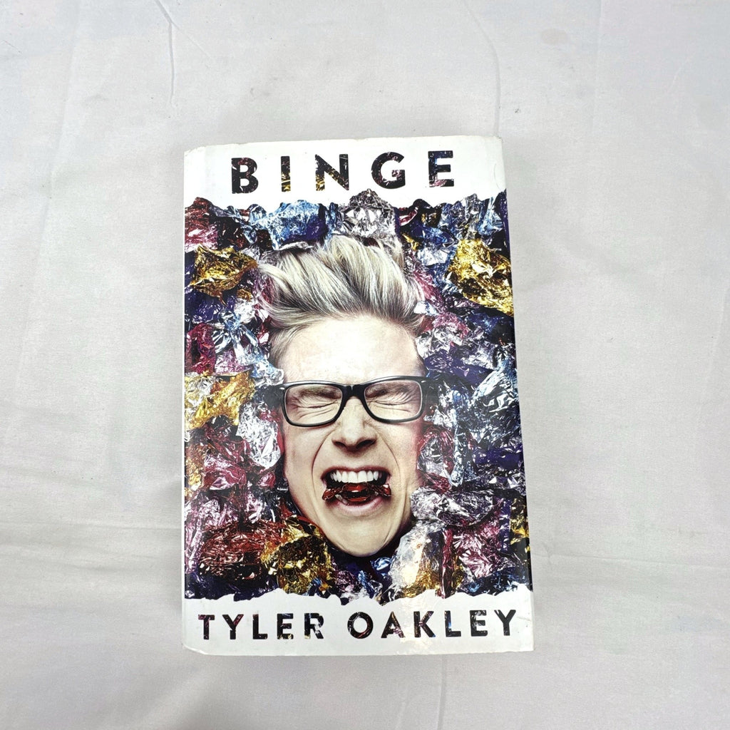 Hardcover copy of Binge by Tyler Oakley 2015 memoir with dust jacket