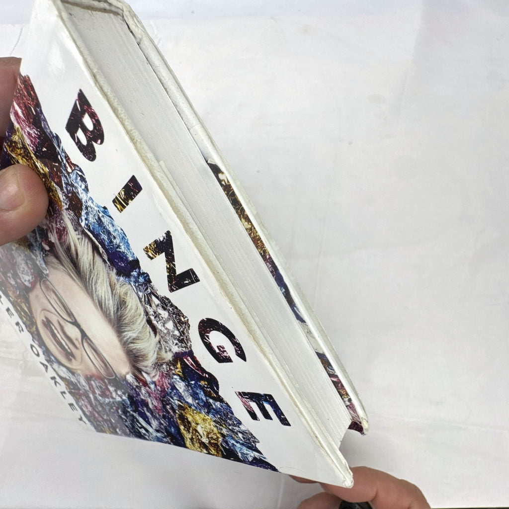 Hardcover copy of Binge by Tyler Oakley 2015 memoir with dust jacket