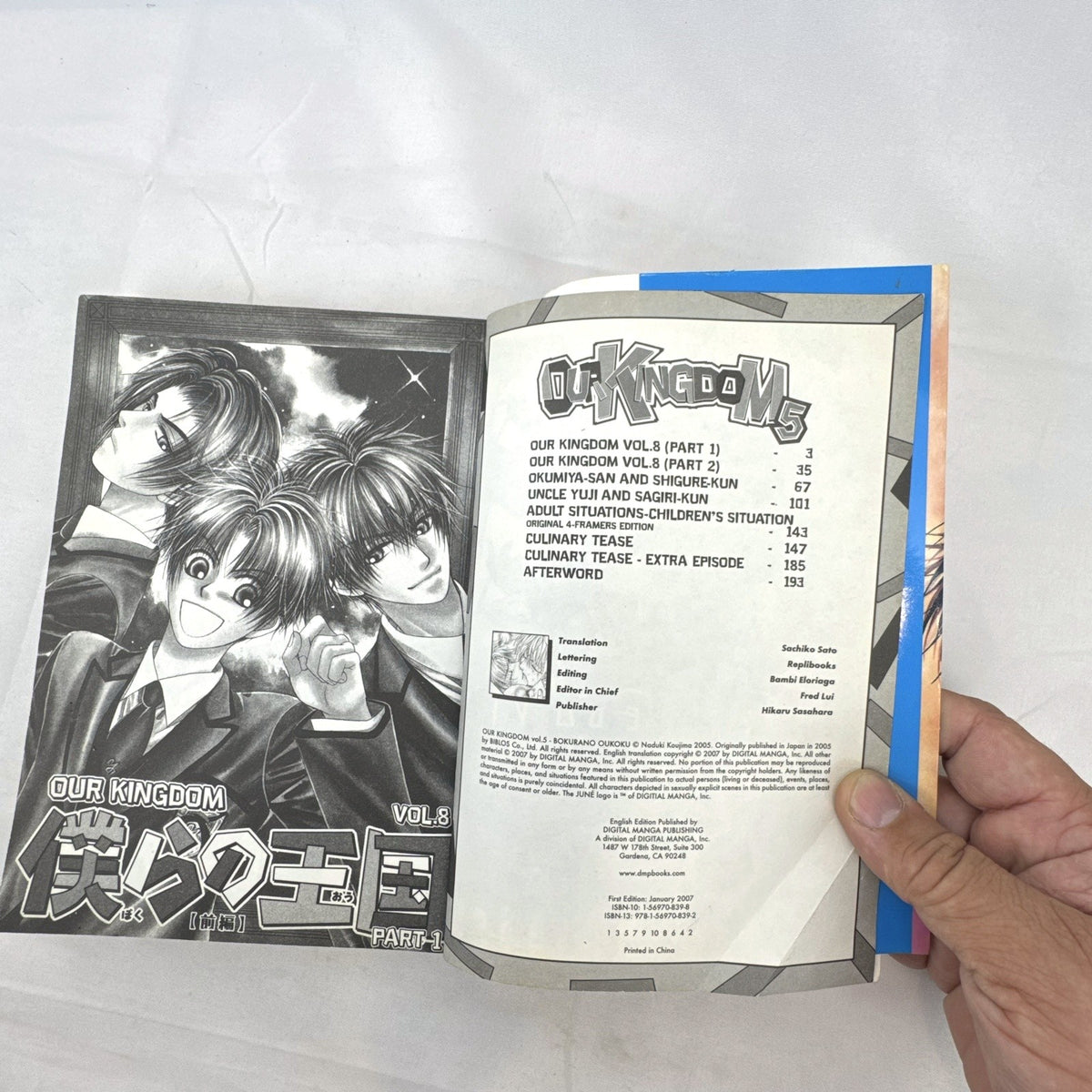 Front cover of Our Kingdom Volume 5 English manga graphic novel by Naduki Koujima published by DMP June imprint