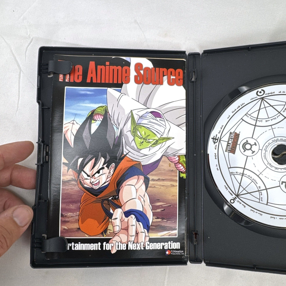 Front cover of the FUNimation Fullmetal Alchemist Volume 1 The Curse DVD release