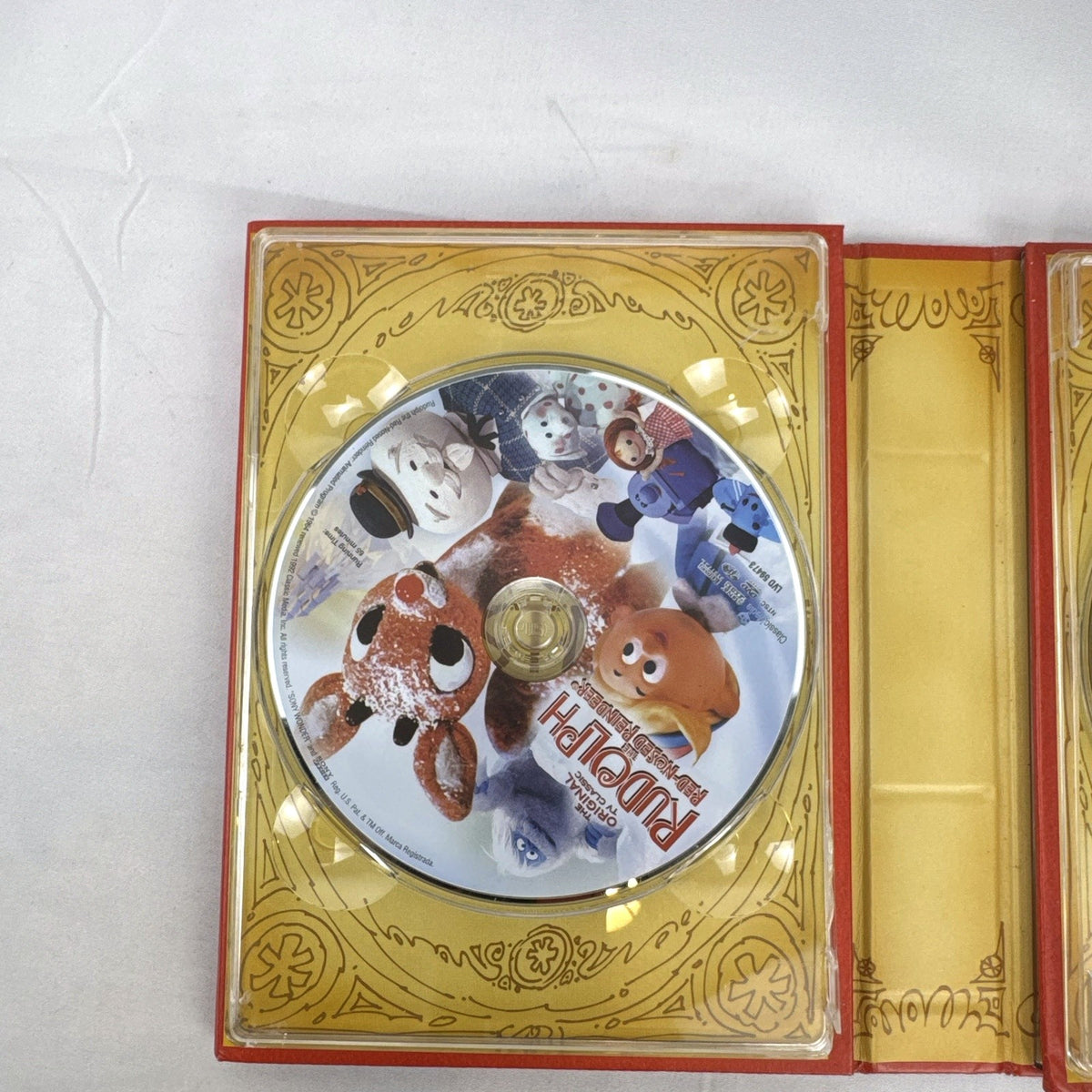 The Original Television Christmas Classics DVD box set slipcase cover featuring Rudolph and Frosty