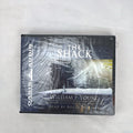 Factory-sealed Oasis Audio unabridged CD edition of The Shack by William P. Young in tall clamshell packaging.