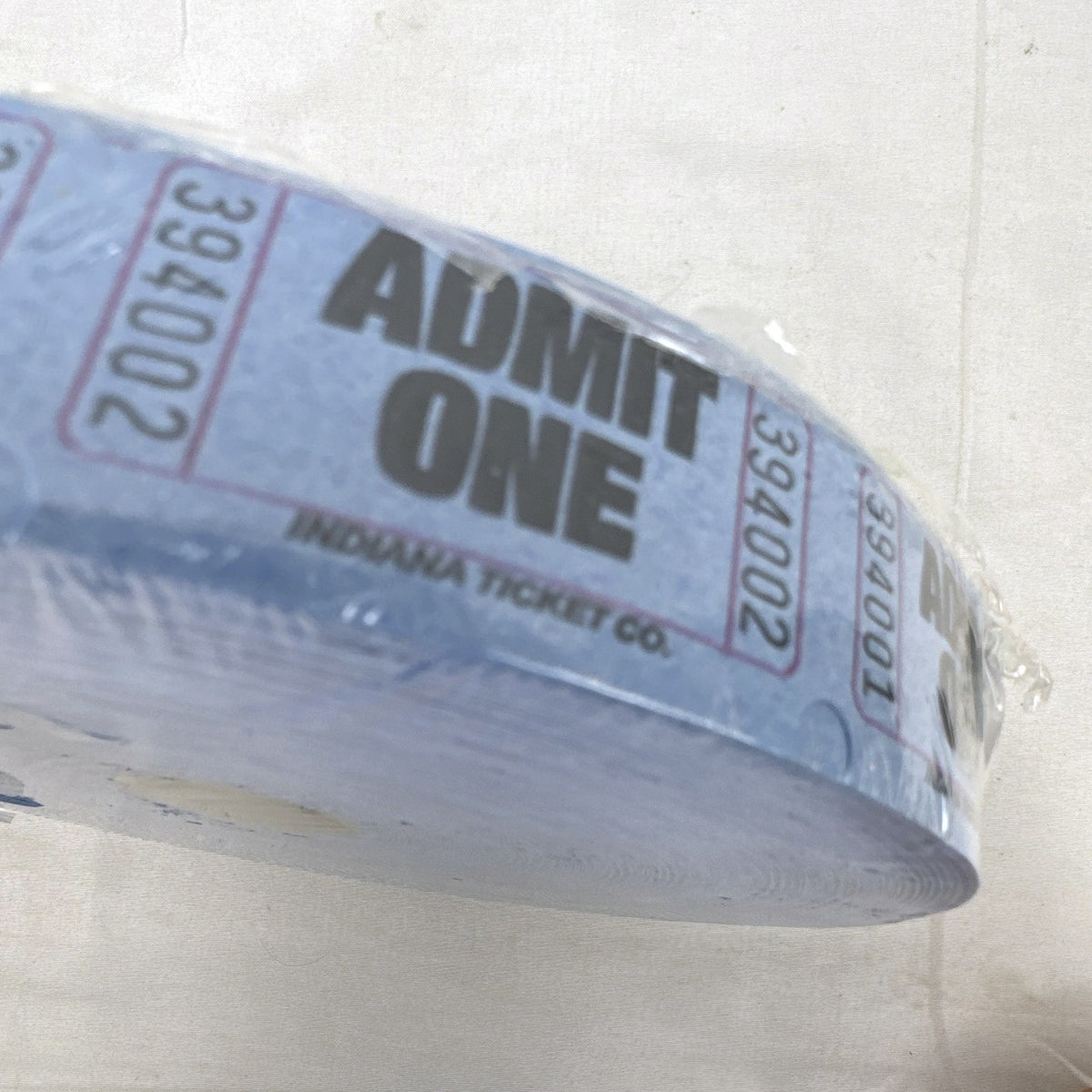 Factory sealed roll of 2000 blue Amscan Admit One paper tickets made in the USA.