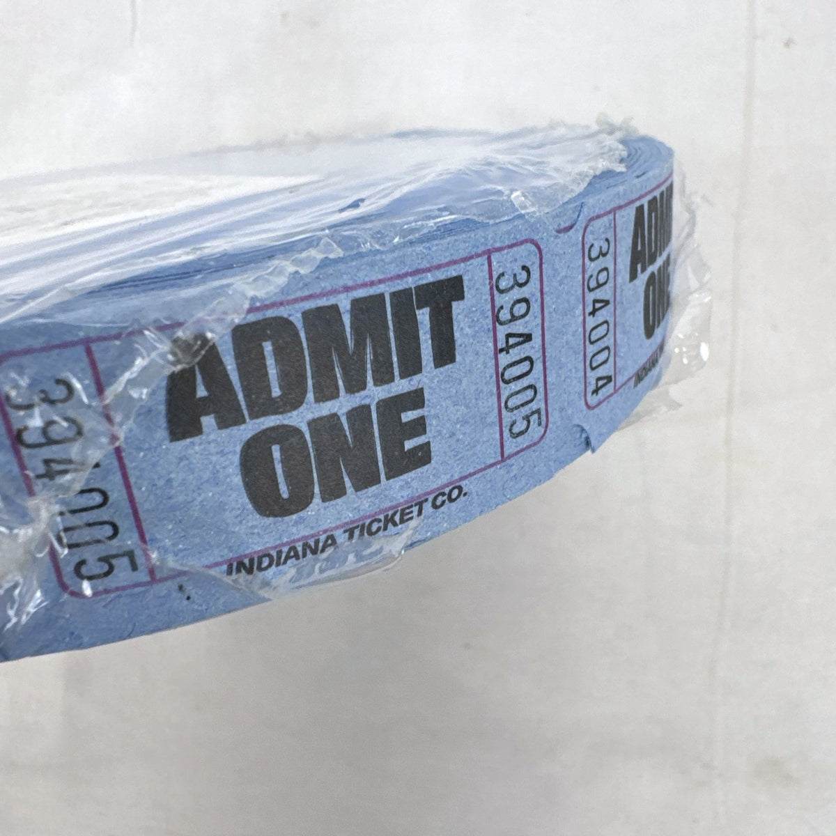 Factory sealed roll of 2000 blue Amscan Admit One paper tickets made in the USA.